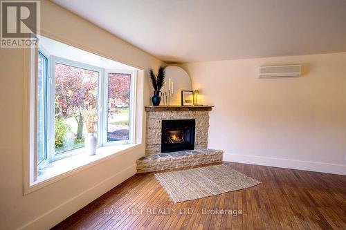 1635 7Th Avenue W, Owen Sound, ON - Indoor Photo Showing Living Room With Fireplace