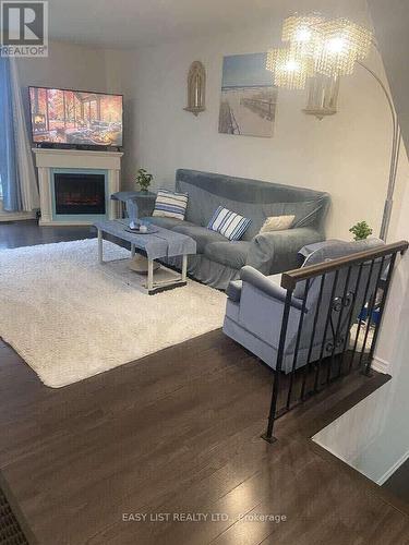 246 Romulus Private, Ottawa, ON - Indoor Photo Showing Living Room With Fireplace