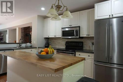18 Mill Street, Essa, ON - Indoor Photo Showing Kitchen With Double Sink
