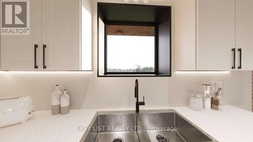 102 - 20 Green Arbour Way, Kawartha Lakes, ON - Indoor Photo Showing Kitchen With Double Sink