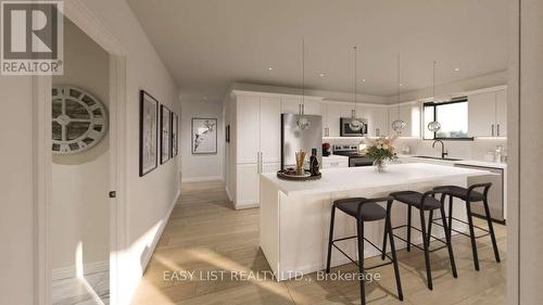 102 - 20 Green Arbour Way, Kawartha Lakes, ON - Indoor Photo Showing Kitchen