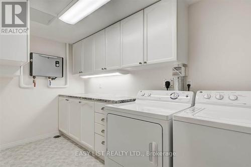 311 - 8 Huron Street, Kawartha Lakes, ON - Indoor Photo Showing Laundry Room