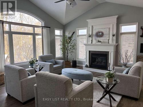 20 Ensley Place, Central Elgin, ON - Indoor Photo Showing Living Room With Fireplace
