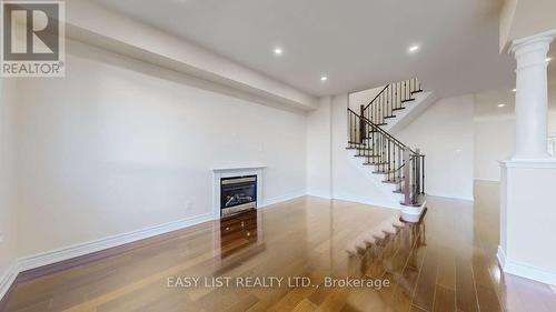 55 Steamer Drive, Whitby, ON - Indoor Photo Showing Other Room With Fireplace