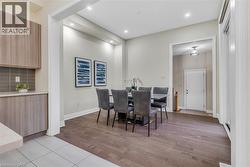 Dining area featuring light tile patterned flooring and recessed lighting - 