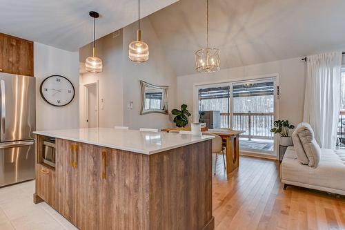 Cuisine - 63 12E Avenue, Saint-Hippolyte, QC - Indoor Photo Showing Other Room