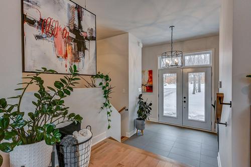 Hall d'entrée/Vestibule - 63 12E Avenue, Saint-Hippolyte, QC - Indoor Photo Showing Other Room