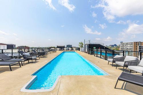 Pool - 414-1550 Rue Des Bassins, Montréal (Le Sud-Ouest), QC - Outdoor With In Ground Pool
