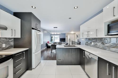 Cuisine - 277 Rue Paré, L'Assomption, QC - Indoor Photo Showing Kitchen With Upgraded Kitchen