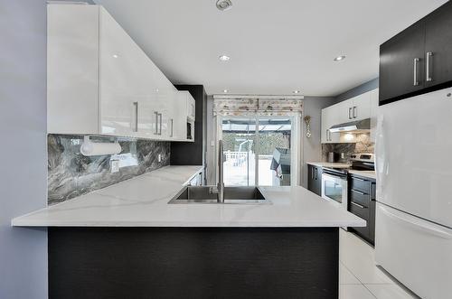 Cuisine - 277 Rue Paré, L'Assomption, QC - Indoor Photo Showing Kitchen With Upgraded Kitchen