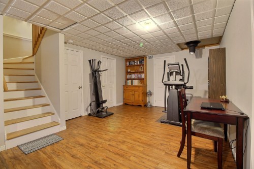 Salle familiale - 82 Rue Goudreau, Magog, QC - Indoor Photo Showing Gym Room