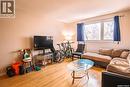 6 4 Neill Place, Regina, SK  - Indoor Photo Showing Living Room 