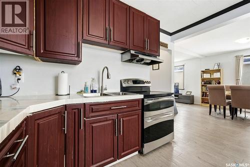 414 18Th Avenue, Regina, SK - Indoor Photo Showing Kitchen With Double Sink