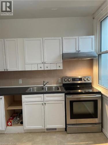 206 Locke Street, Hamilton, ON - Indoor Photo Showing Kitchen With Double Sink