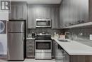 707 - 150 Main Street W, Hamilton, ON  - Indoor Photo Showing Kitchen With Double Sink With Upgraded Kitchen 