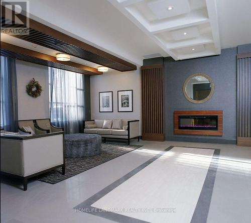 707 - 150 Main Street W, Hamilton, ON - Indoor With Fireplace