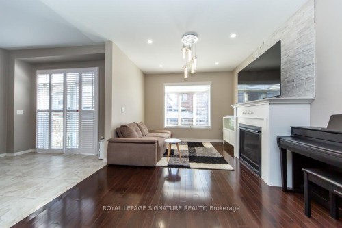 3260 Sealey Crescent, Burlington, ON - Indoor Photo Showing Living Room With Fireplace