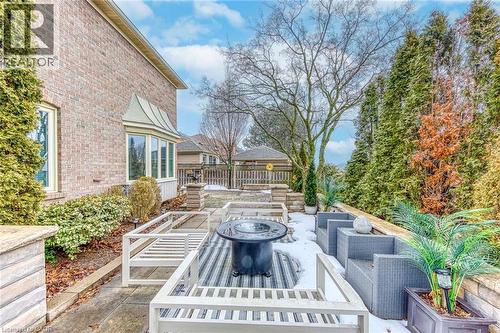 View of patio / terrace featuring an outdoor living space with a fire pit - 4220 Millcroft Park Drive, Burlington, ON - Outdoor With Deck Patio Veranda