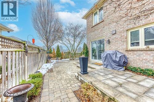 Fenced backyard featuring a patio area and a grill - 4220 Millcroft Park Drive, Burlington, ON - Outdoor