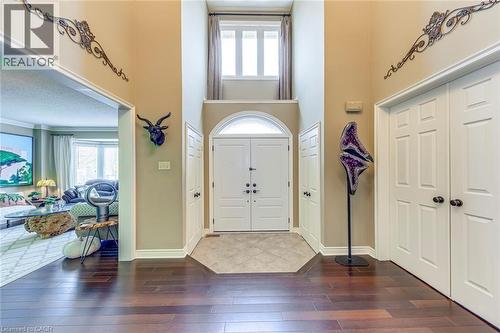 Foyer featuring a high ceiling and dark wood-type flooring - 4220 Millcroft Park Drive, Burlington, ON - Indoor Photo Showing Other Room