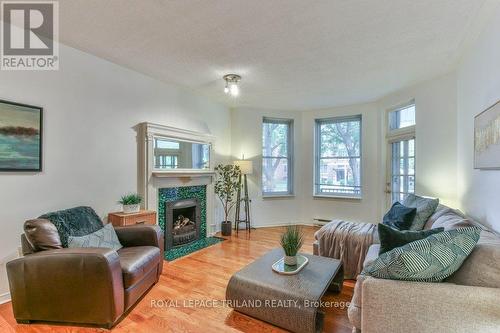 101 - 285 Queens Avenue, London East (East F), ON - Indoor Photo Showing Living Room With Fireplace