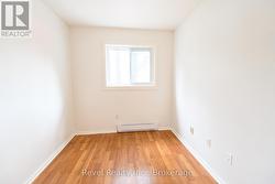 Main floor second bedroom- freshly painted - 