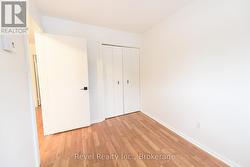 Main floor second bedroom- laminate floor - 