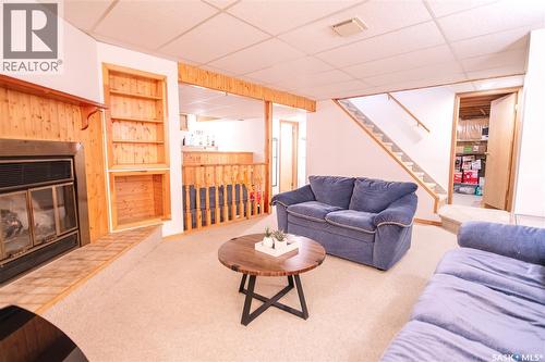 1222 Flexman Crescent N, Regina, SK - Indoor Photo Showing Living Room With Fireplace