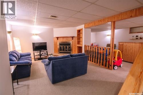 1222 Flexman Crescent N, Regina, SK - Indoor With Fireplace