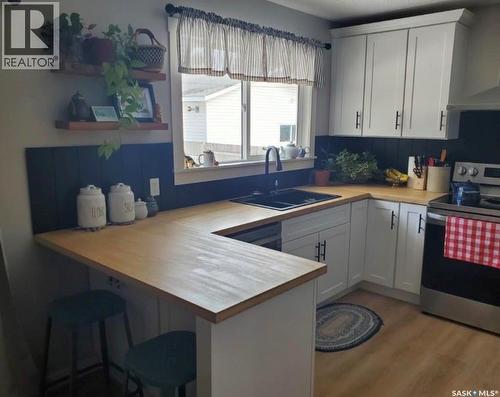 105 6Th Avenue S, Big River, SK - Indoor Photo Showing Kitchen With Double Sink