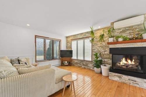 Living Room - 25 31E Avenue, Saint-Blaise-Sur-Richelieu, QC - Indoor Photo Showing Living Room With Fireplace