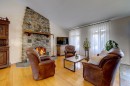 Salon - 41 Rue Champlain, Saint-Constant, QC  - Indoor Photo Showing Living Room With Fireplace 
