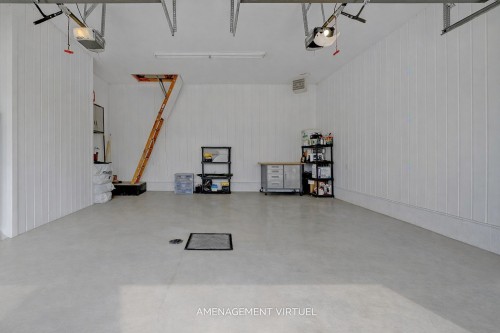 Garage - 41 Rue Champlain, Saint-Constant, QC - Indoor Photo Showing Garage