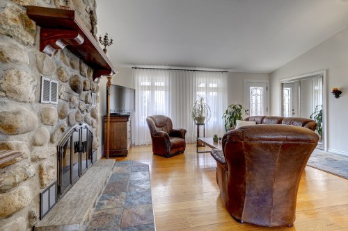 Salon - 41 Rue Champlain, Saint-Constant, QC - Indoor Photo Showing Living Room With Fireplace