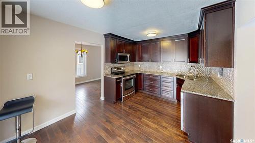 50 Lowry Place, Regina, SK - Indoor Photo Showing Kitchen With Double Sink