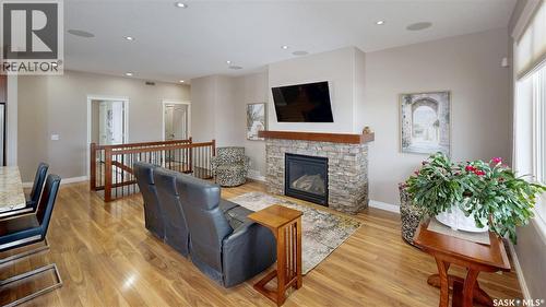 4342 Skinner Place, Regina, SK - Indoor Photo Showing Living Room With Fireplace