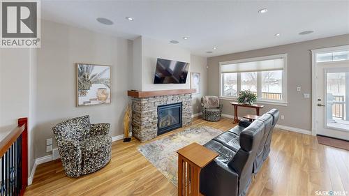 4342 Skinner Place, Regina, SK - Indoor Photo Showing Living Room With Fireplace