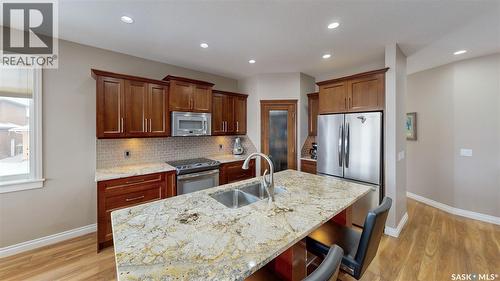 4342 Skinner Place, Regina, SK - Indoor Photo Showing Kitchen With Stainless Steel Kitchen With Double Sink With Upgraded Kitchen