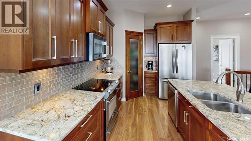 4342 Skinner Place, Regina, SK - Indoor Photo Showing Kitchen With Stainless Steel Kitchen With Double Sink With Upgraded Kitchen