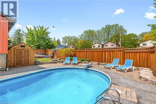 25 Burke Drive, Caledonia, ON - Outdoor With In Ground Pool With Deck Patio Veranda With Backyard