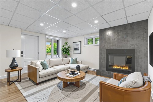 Salle familiale - 185 Rue Du Val-Joli, Sainte-Catherine-De-Hatley, QC - Indoor Photo Showing Living Room With Fireplace