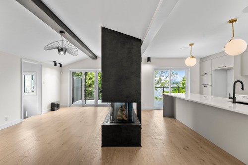 Salon - 185 Rue Du Val-Joli, Sainte-Catherine-De-Hatley, QC - Indoor With Fireplace