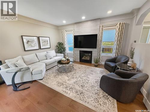 821 Wallman Place, Swift Current, SK - Indoor Photo Showing Living Room With Fireplace