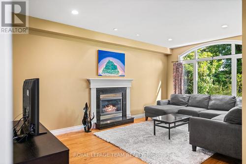 1601 Apeldoorn Avenue, Ottawa, ON - Indoor Photo Showing Living Room With Fireplace