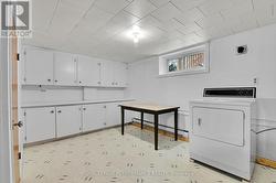 bsmt hobby room was laundry could be converted bac - 