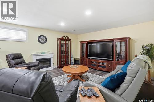 5053 Canuck Crescent, Regina, SK - Indoor Photo Showing Living Room With Fireplace