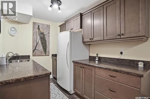 5053 Canuck Crescent, Regina, SK - Indoor Photo Showing Kitchen With Double Sink