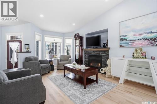 5053 Canuck Crescent, Regina, SK - Indoor Photo Showing Living Room With Fireplace