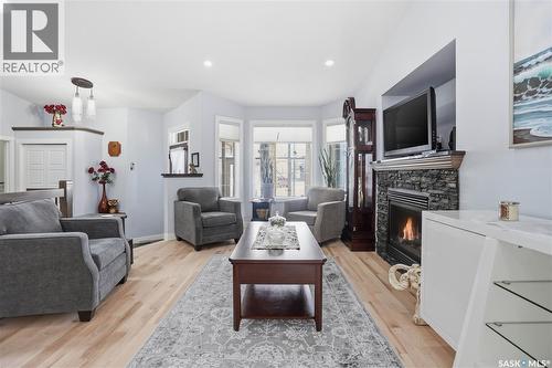 5053 Canuck Crescent, Regina, SK - Indoor Photo Showing Living Room With Fireplace