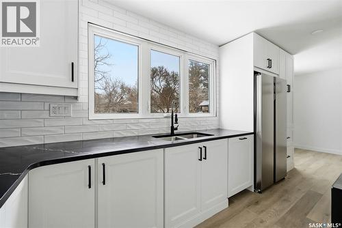 8 Thatcher Road, Regina, SK - Indoor Photo Showing Kitchen With Double Sink